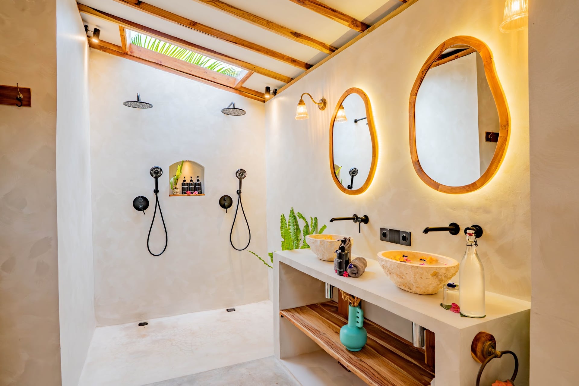 Bask in the gentle sea breeze as light filters through your private b…