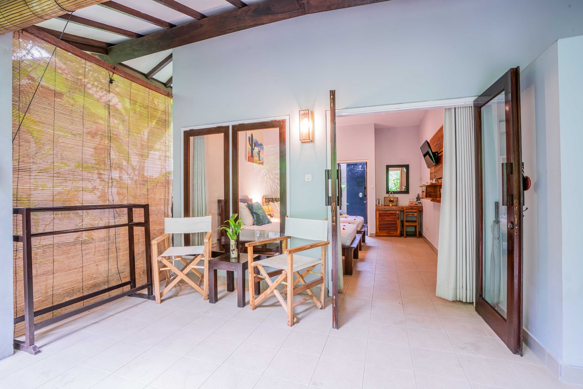 Bask in the morning light as you unwind on our sun loungers, surround…