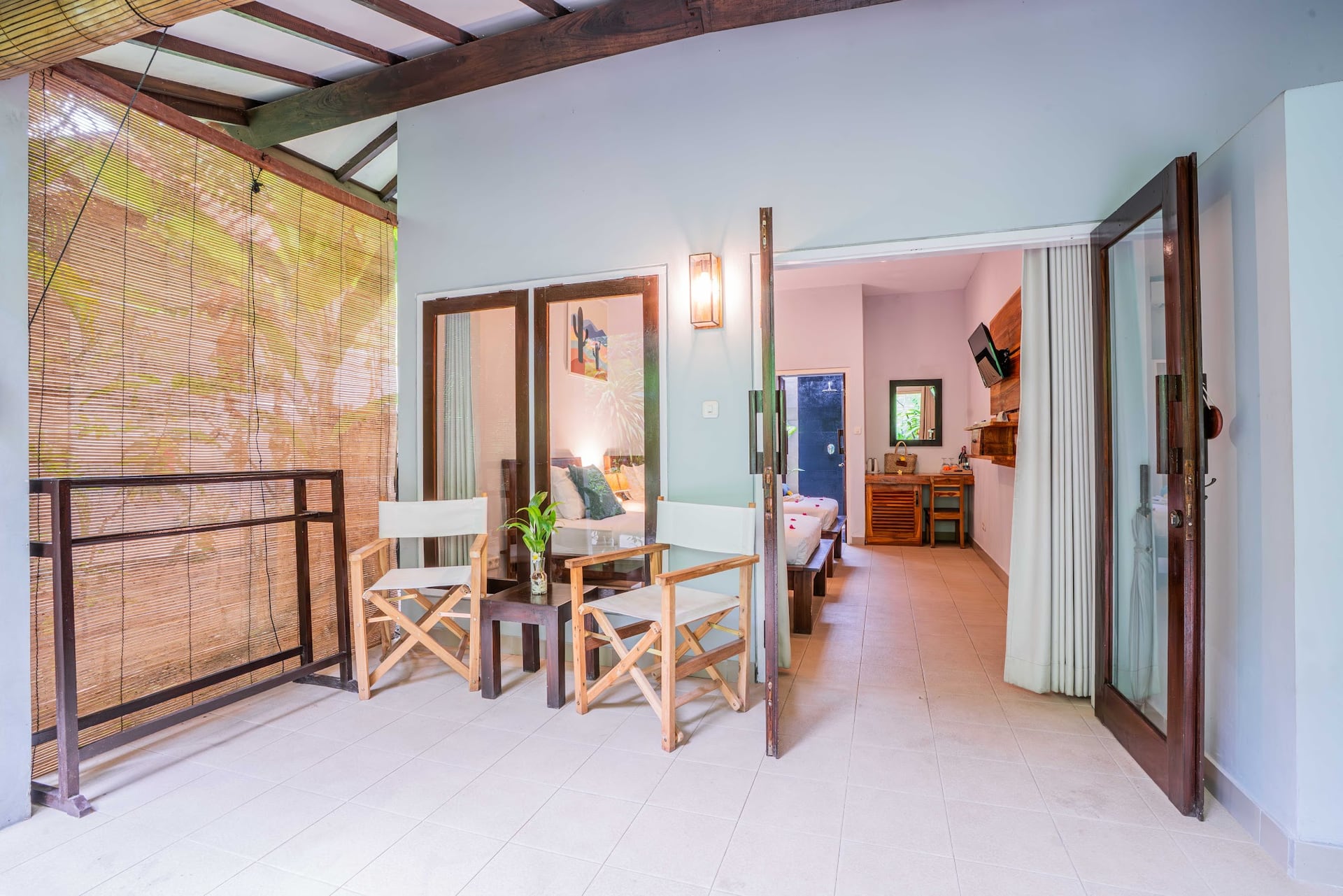 Bask in the morning light as you unwind on our sun loungers, surround…