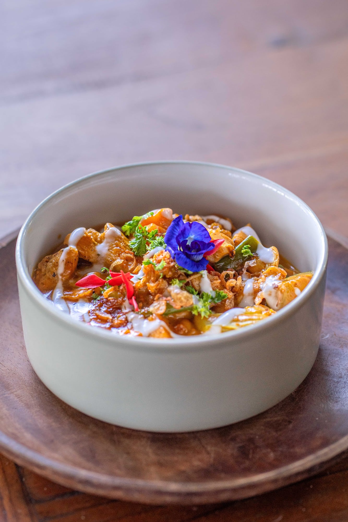 Experience the rich flavors of our signature dish: the Chicken Curry.…