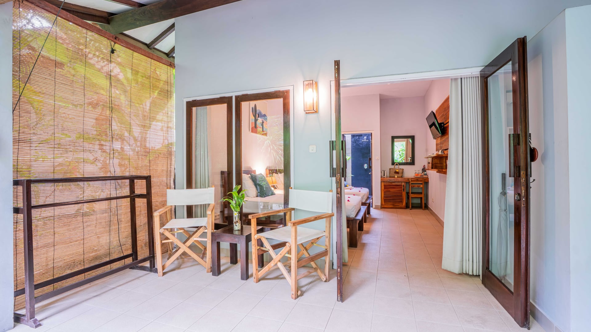 Bask in the morning light as you unwind on our sun loungers, surround…