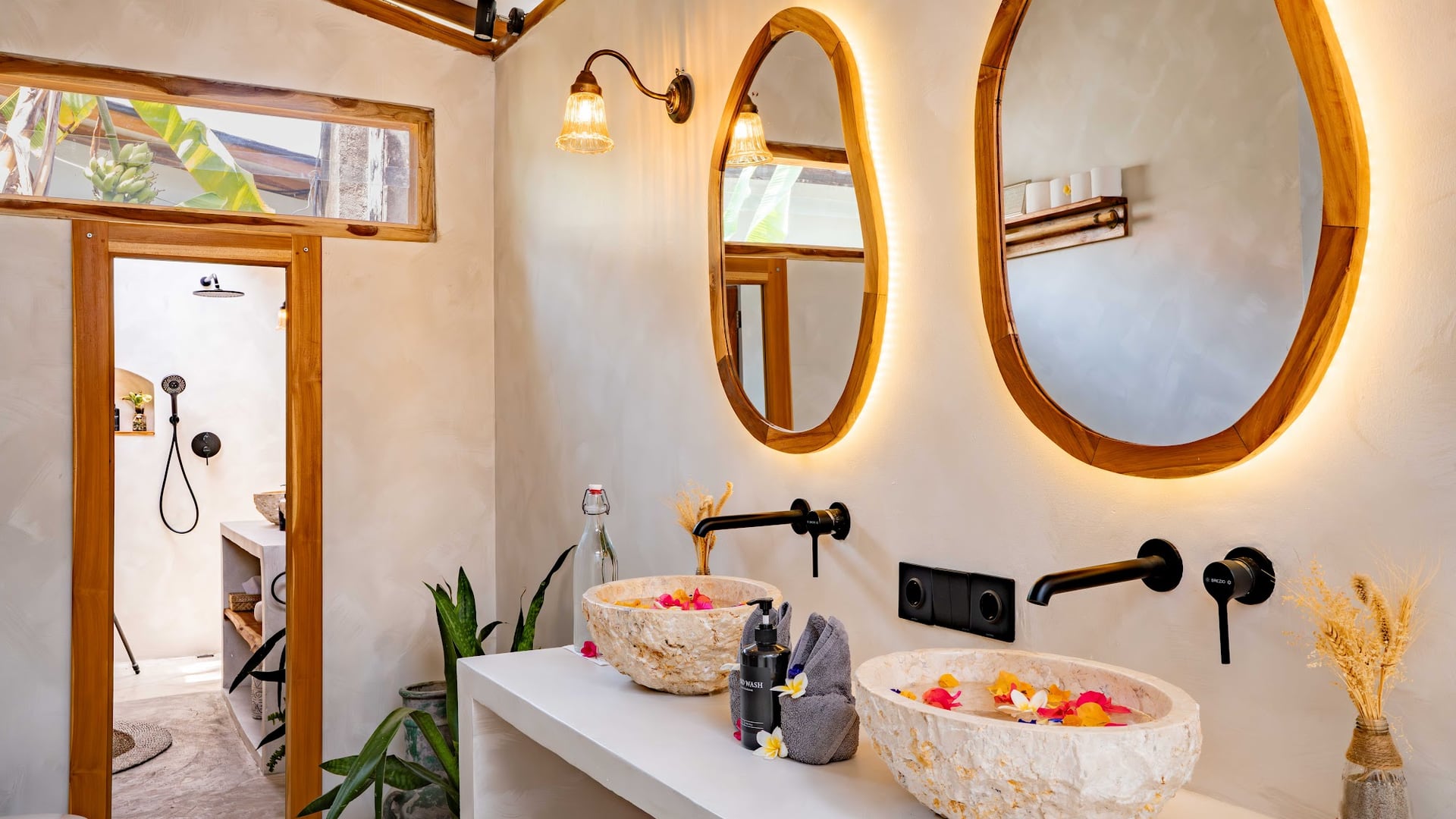 Step into a serene sanctuary where tropical light dances through clea…