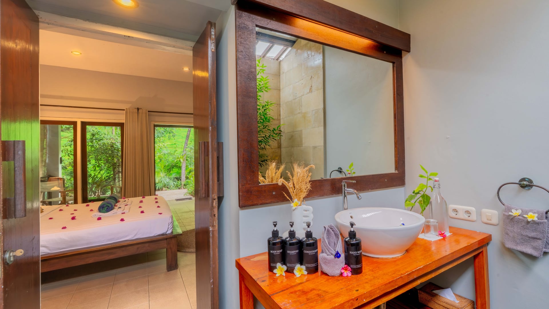 Enjoy the serene beauty of our tropical gardens and refreshing pool a…