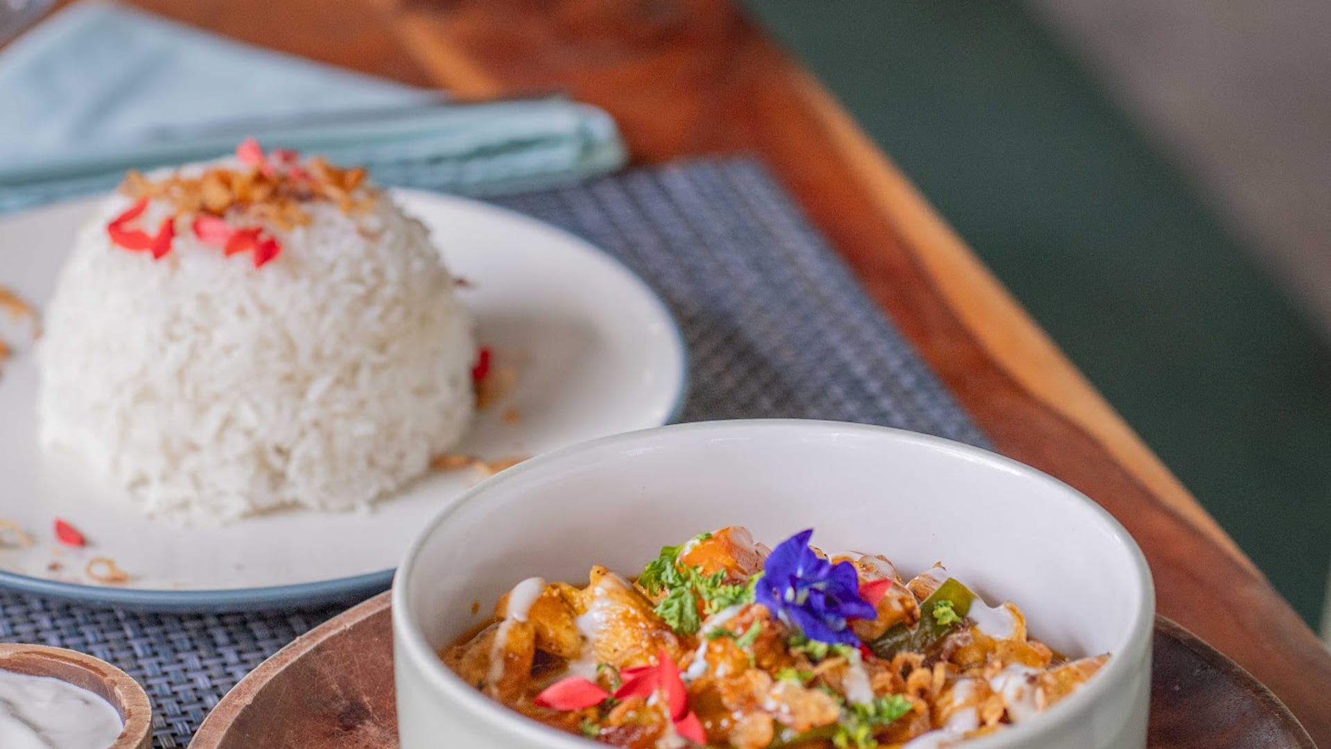 Picture a vibrant evening at Taste Café, where colorful dishes deligh…