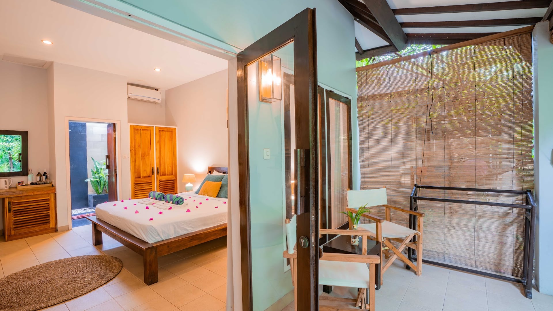 Morning light dances over the sun loungers, while palm trees sway gen…