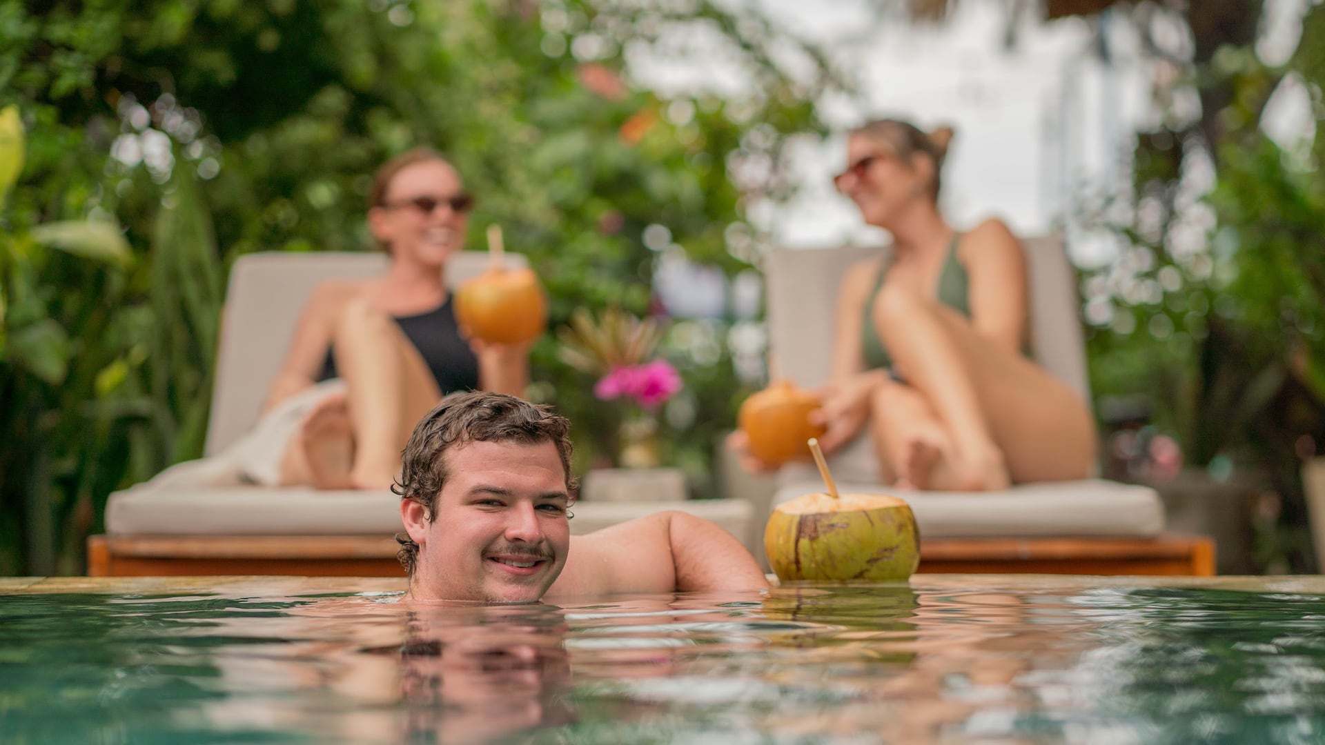 Picture this: an iced latte and a vibrant smoothie on a sun-kissed be…