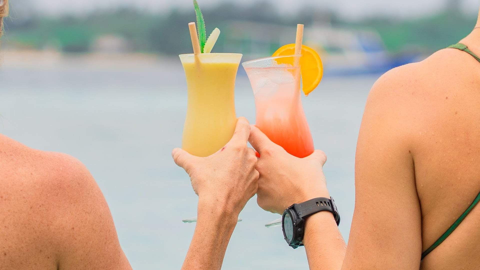 As the sun dips below the horizon, enjoy a refreshing cocktail while…