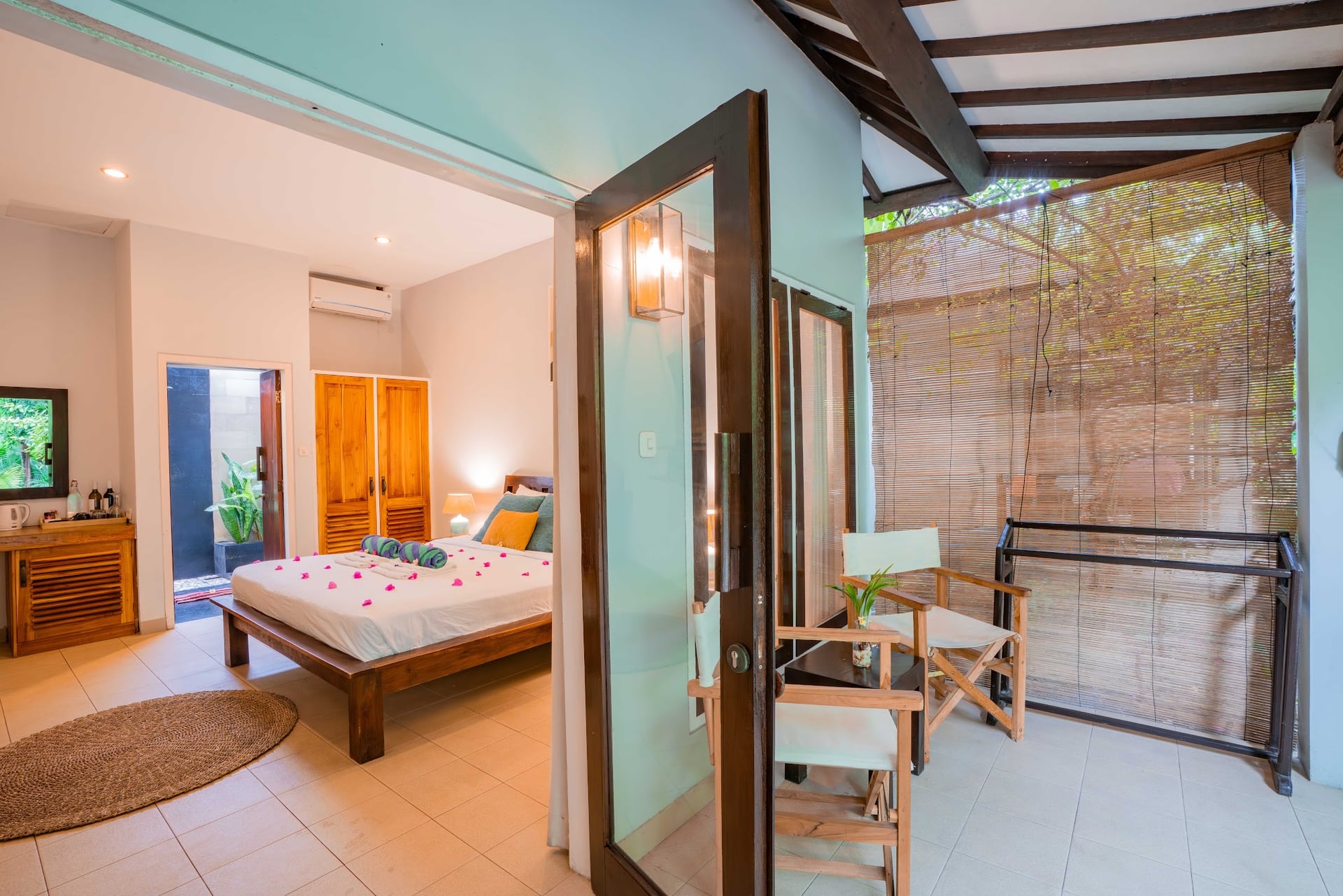 Bask in the morning light over sun loungers, with gentle palms swayin…